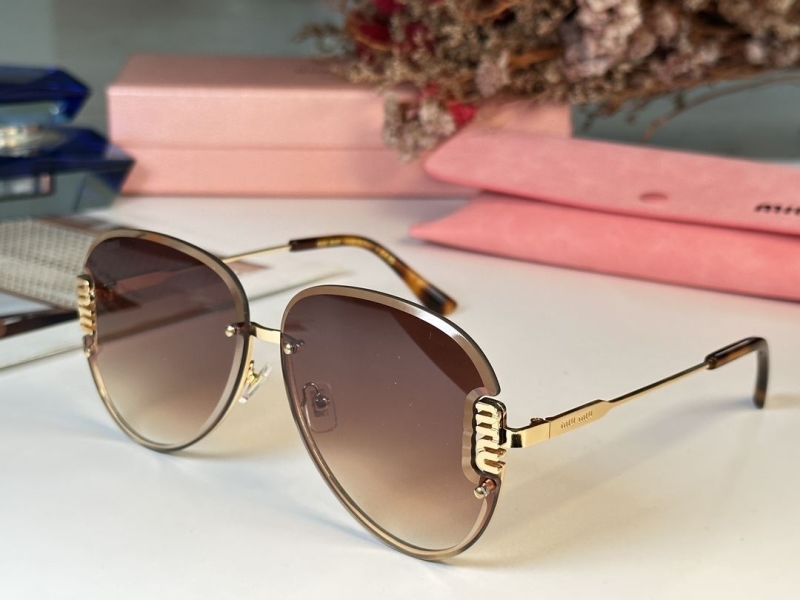 Miu miu Sunglasses